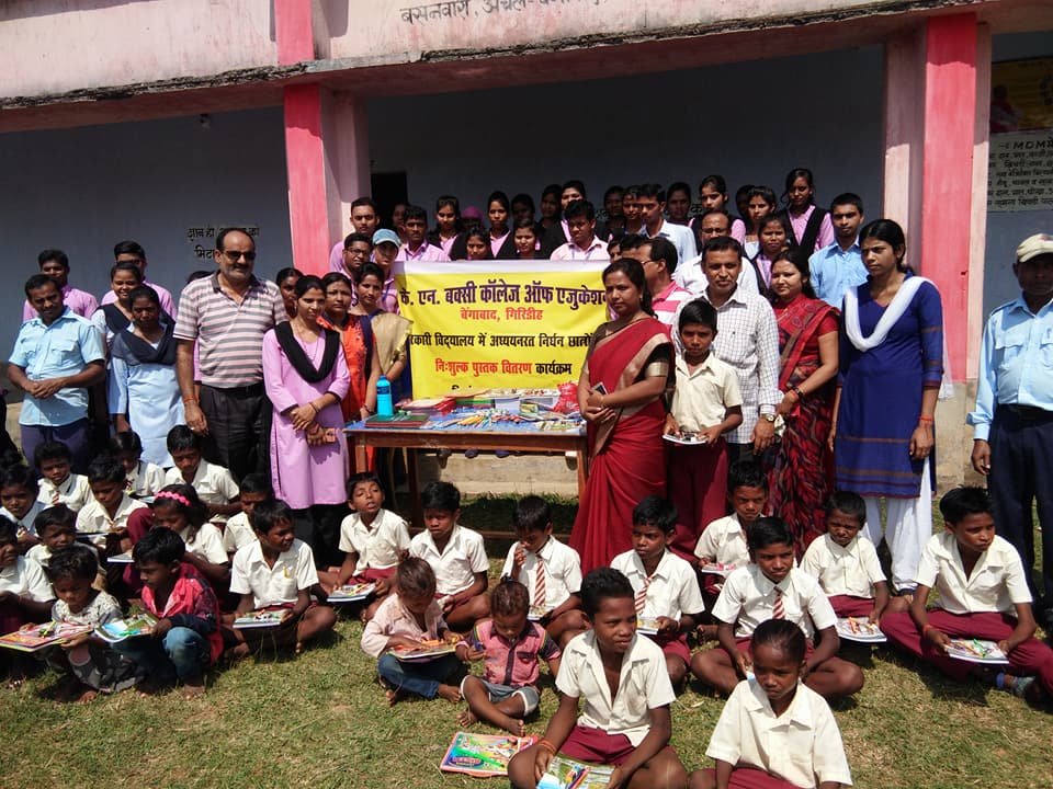 Free book and stationery were distributed by K.N